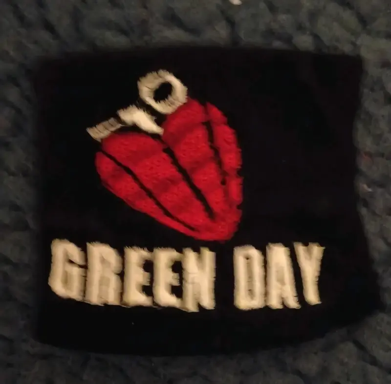 Muñequera Green Day negra