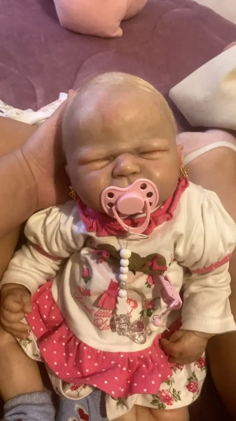 Muñeca reborn con chupete original