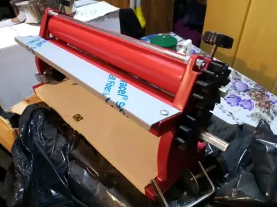 Máquina laminadora manual - miniatura 1
