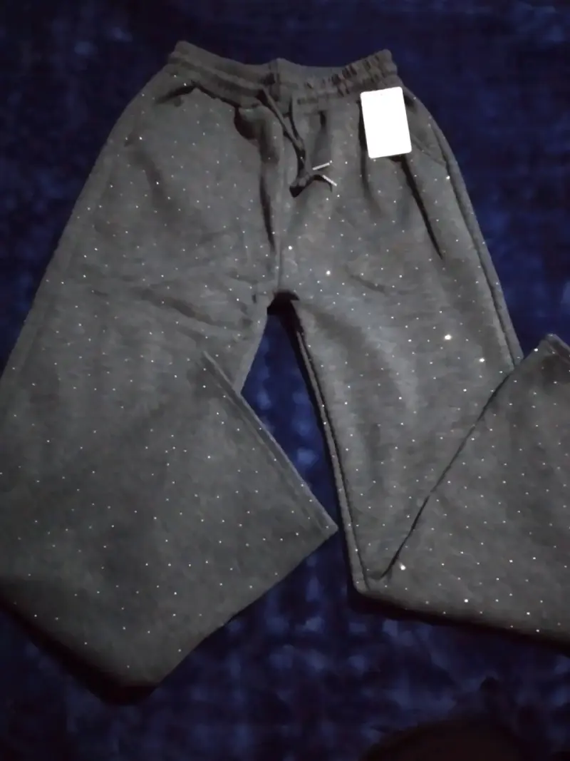 Pantalones tipo palazzo con brillo