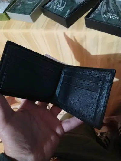 Billetera negra Coach - miniatura 1