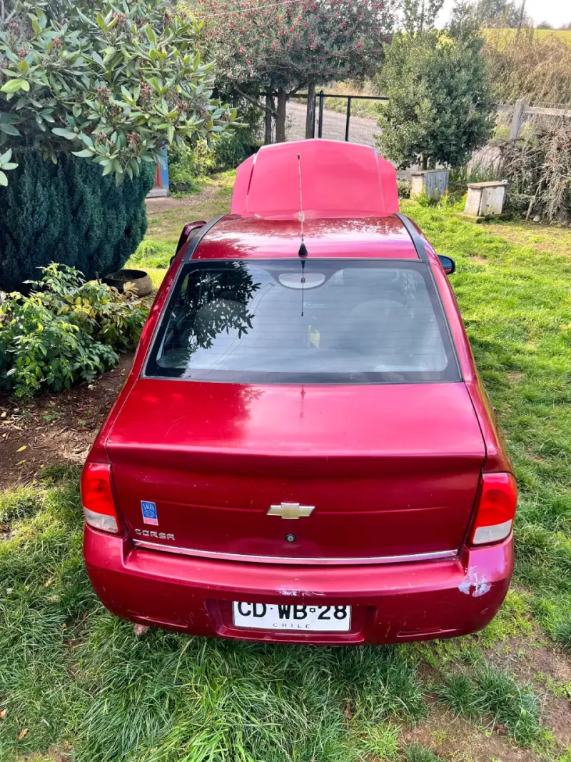 Chevrolet Corsa 2010 rojo - 1