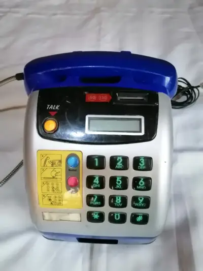 Teléfono vintage de adorno - miniatura 1