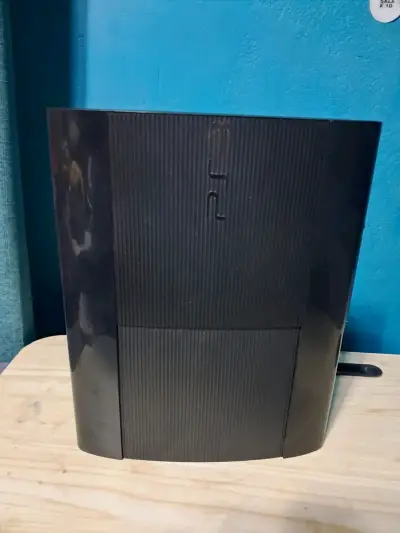 Consola PlayStation 3 negra con juegos - miniatura 1