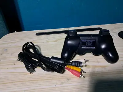Consola PlayStation 3 negra con juegos - miniatura 5