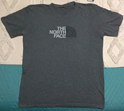 Polera gris The North Face - miniatura 1