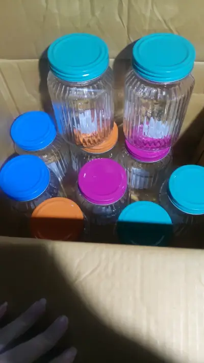 Frascos de vidrio con tapas coloridas - miniatura 1