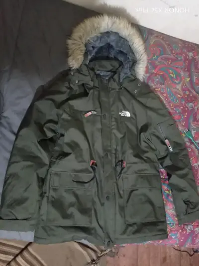 Parka verde con capucha de piel - miniatura 1