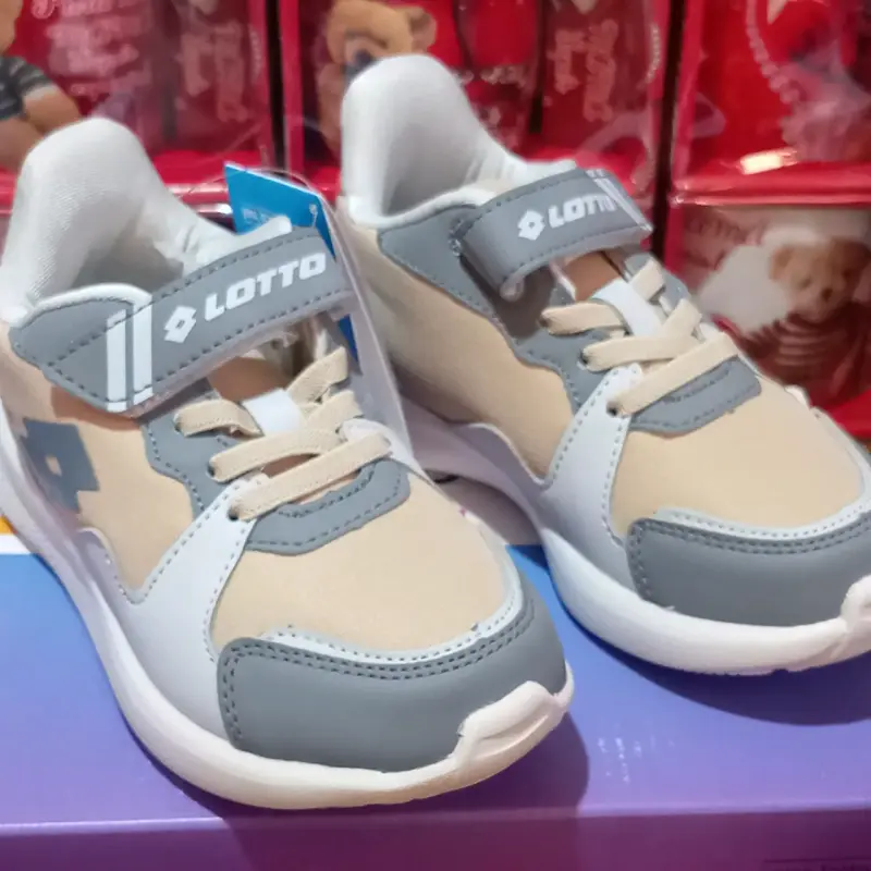 Zapatillas Lotto infantiles beige y gris