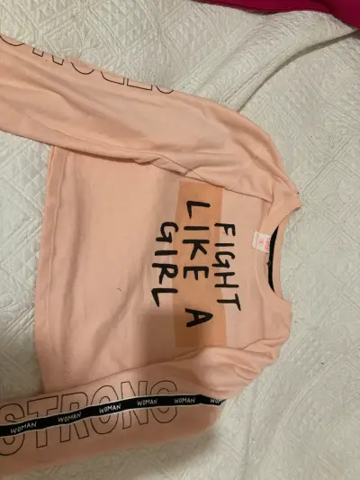 Polera rosada con mensaje - miniatura 2