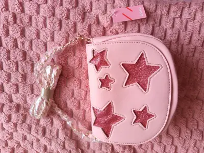Cartera rosa con estrellas - miniatura 1