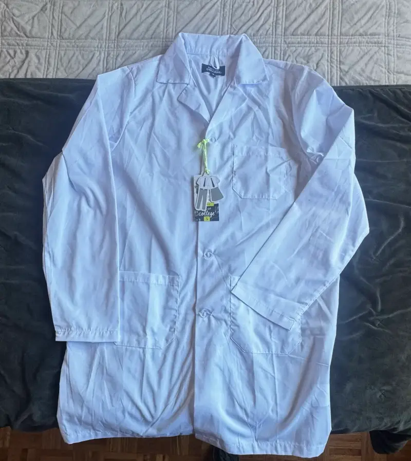 Delantal escolar blanco nuevo