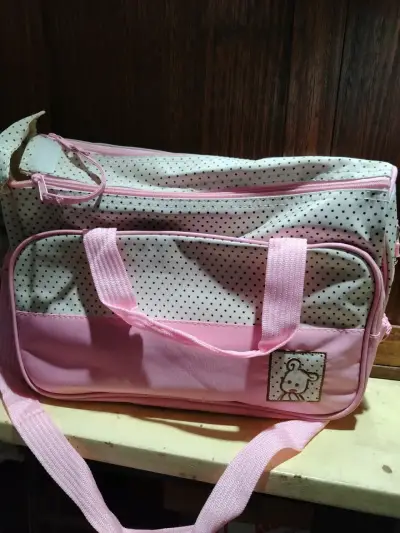 Bolso maternal rosado con lunares - miniatura 1