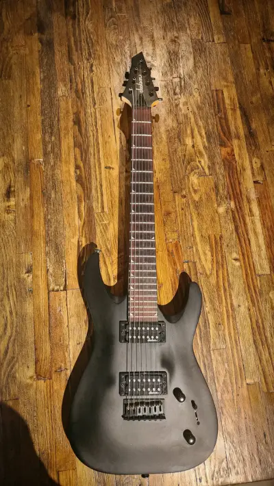 Jackson JS22-7 Dinky 7 cuerdas Satin Black - miniatura 1