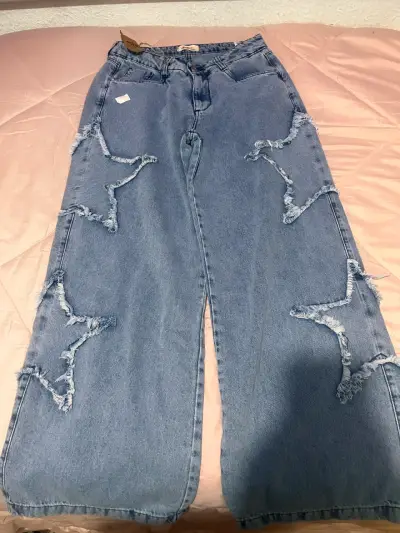 Jeans con diseño de estrellas - miniatura 1