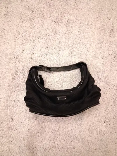 Cartera negra pequeña - miniatura 1