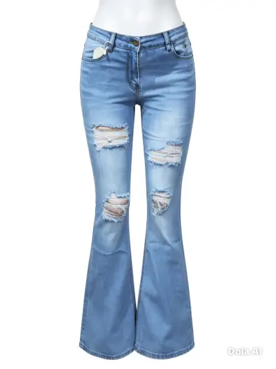 Jeans acampanados desgastados - miniatura 1