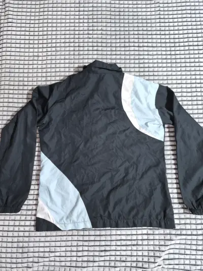 Chaqueta cortaviento azul y celeste - miniatura 3