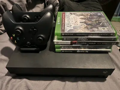 Consola Xbox One X con juegos - miniatura 1