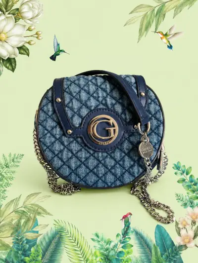 Bolso redondo azul Guess - miniatura 1