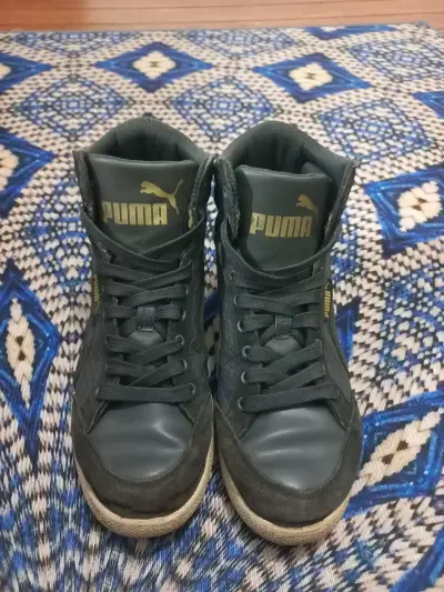 Zapatillas negras Puma - miniatura 1