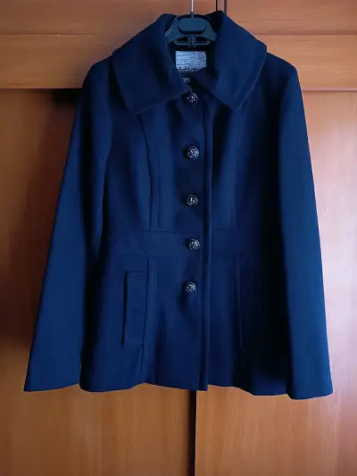Abrigo azul de mujer - miniatura 1