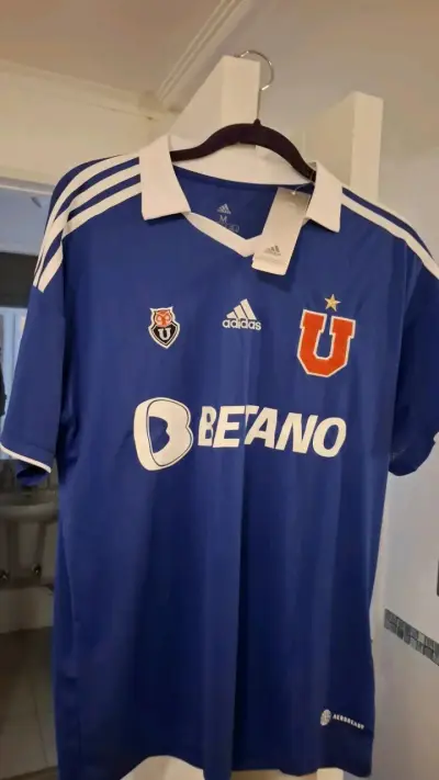 Camiseta fútbol azul con logo - miniatura 1