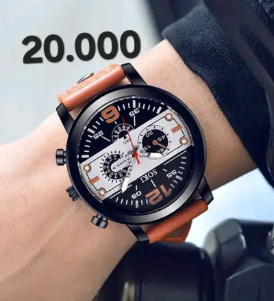 Reloj pulsera negro y marrón - miniatura 1