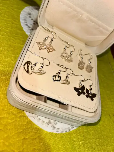 Vendo aros y pulsera de plata - miniatura 1