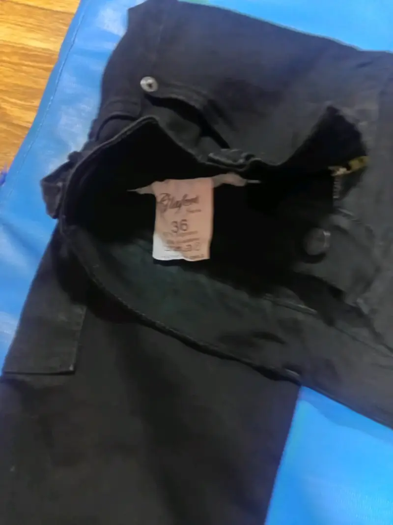 Pantalones negros acampanados - 3