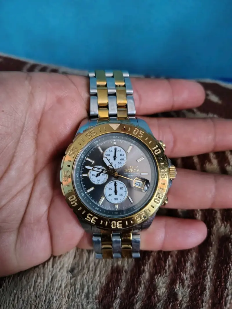 Reloj Invicta bicolor cronógrafo - 3