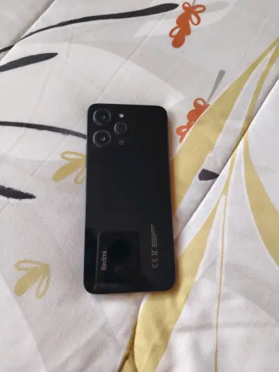 Smartphone Redmi negro en buen estado - miniatura 1