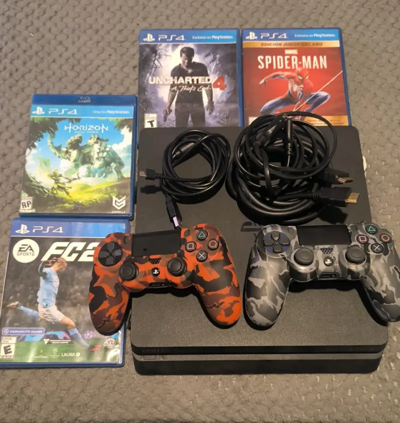 Consola PS4 con juegos y controles