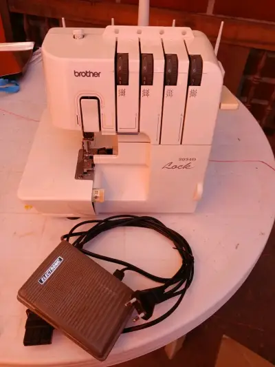 Máquina overlock Brother blanca - miniatura 4