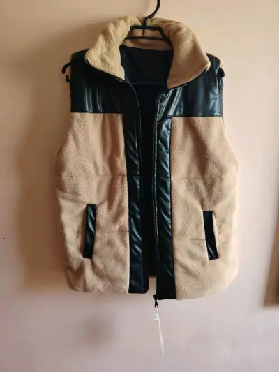 Chaqueta sin mangas nueva - miniatura 2