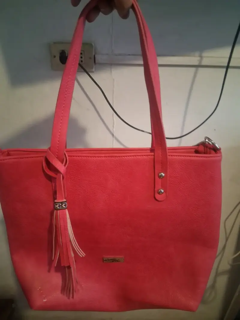 Cartera rosada con flecos - 1