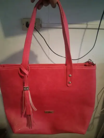 Cartera rosada con flecos - miniatura 1