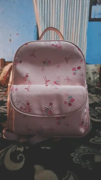 Mochila rosada estampada todo moda - miniatura 2