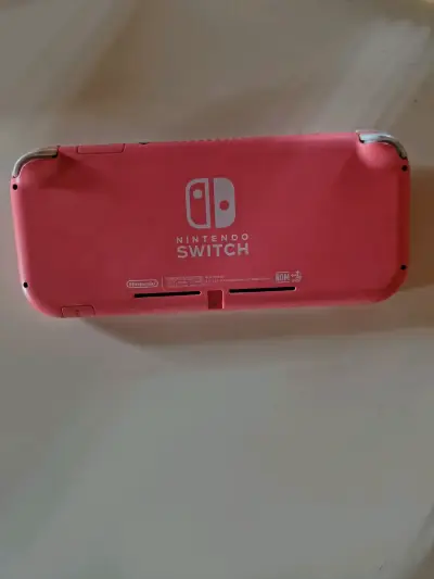 Nintendo Switch Lite Coral 32gb - miniatura 6