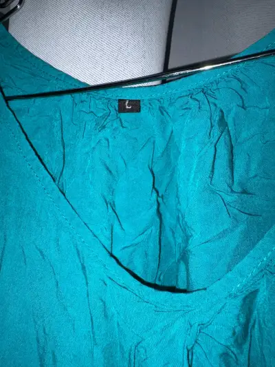 Blusa turquesa talla L - miniatura 1