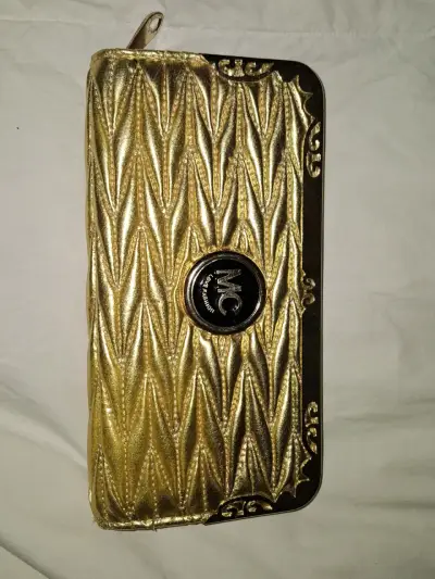 Billetera dorada elegante - miniatura 1