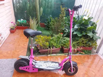 Scooter eléctrico rosa adulto - miniatura 1