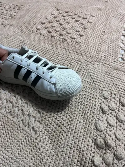 Zapatillas blancas de cuero - miniatura 1