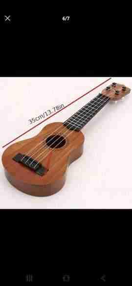 Ukulele coordinación fisica sonido acústico - 4