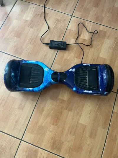 Hoverboard azul con cargador - miniatura 1