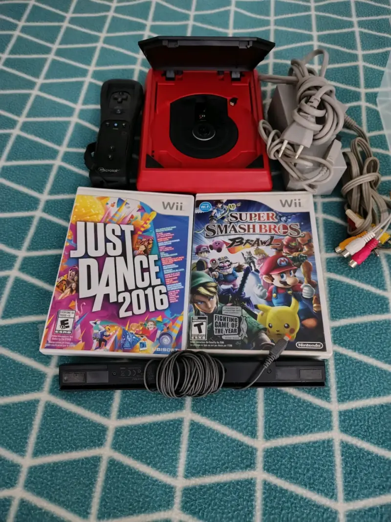 Consola Wii con juegos y accesorios - 1