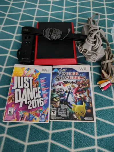 Consola Wii con juegos y accesorios - miniatura 2