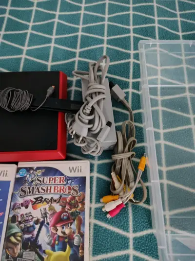 Consola Wii con juegos y accesorios - miniatura 3