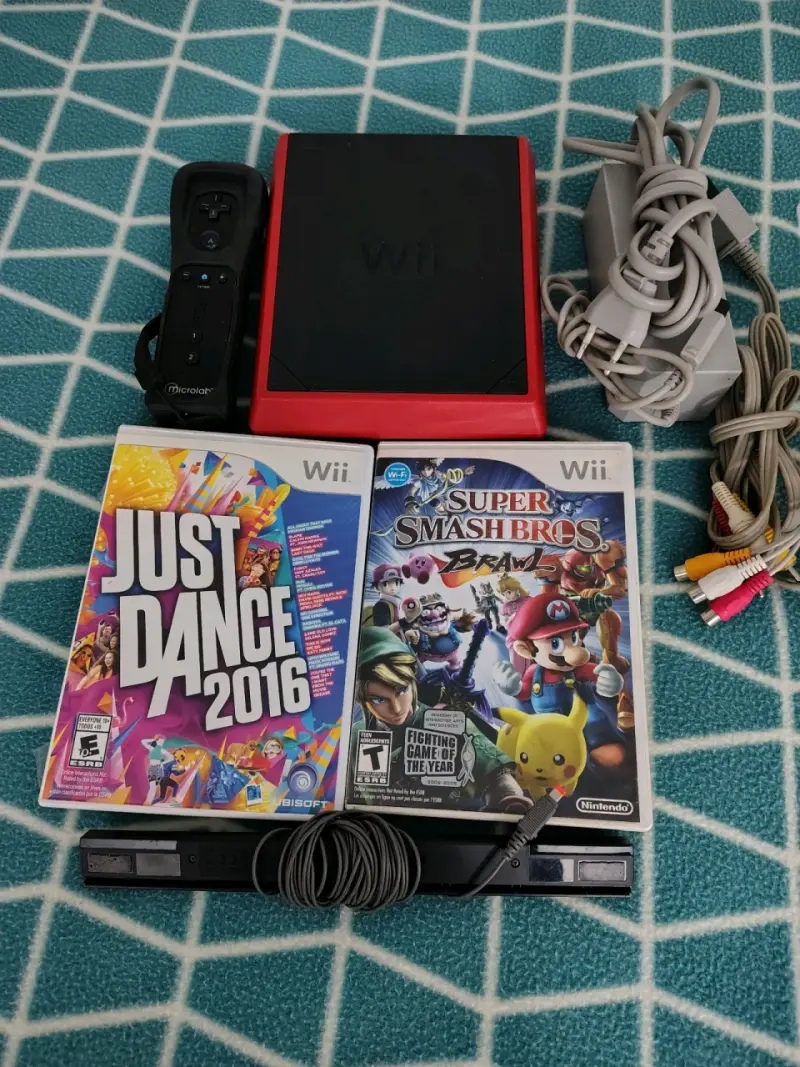Consola Wii con juegos y accesorios - 4