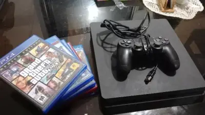 PS4  SLIM 1TB 5 JUEGOS Y MANDO - miniatura 1